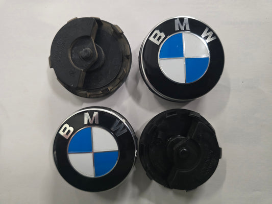 Originele BMW rotating center caps naafkappen vaststaand ø56 mm