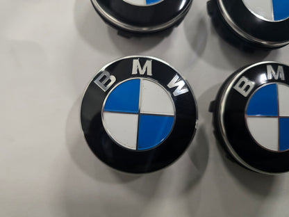Originele BMW rotating center caps naafkappen vaststaand ø56 mm