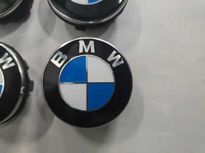 Originele BMW rotating center caps naafkappen vaststaand ø56 mm