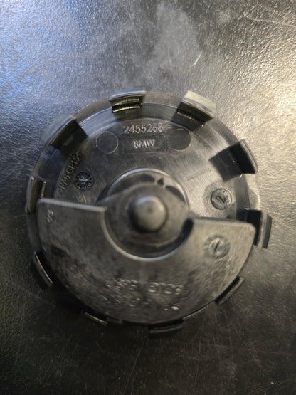 Originele BMW rotating center caps naafkappen vaststaand ø56 mm